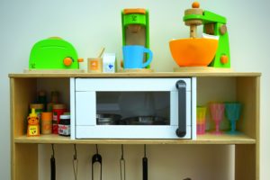 a convection microwave oven in the shelf